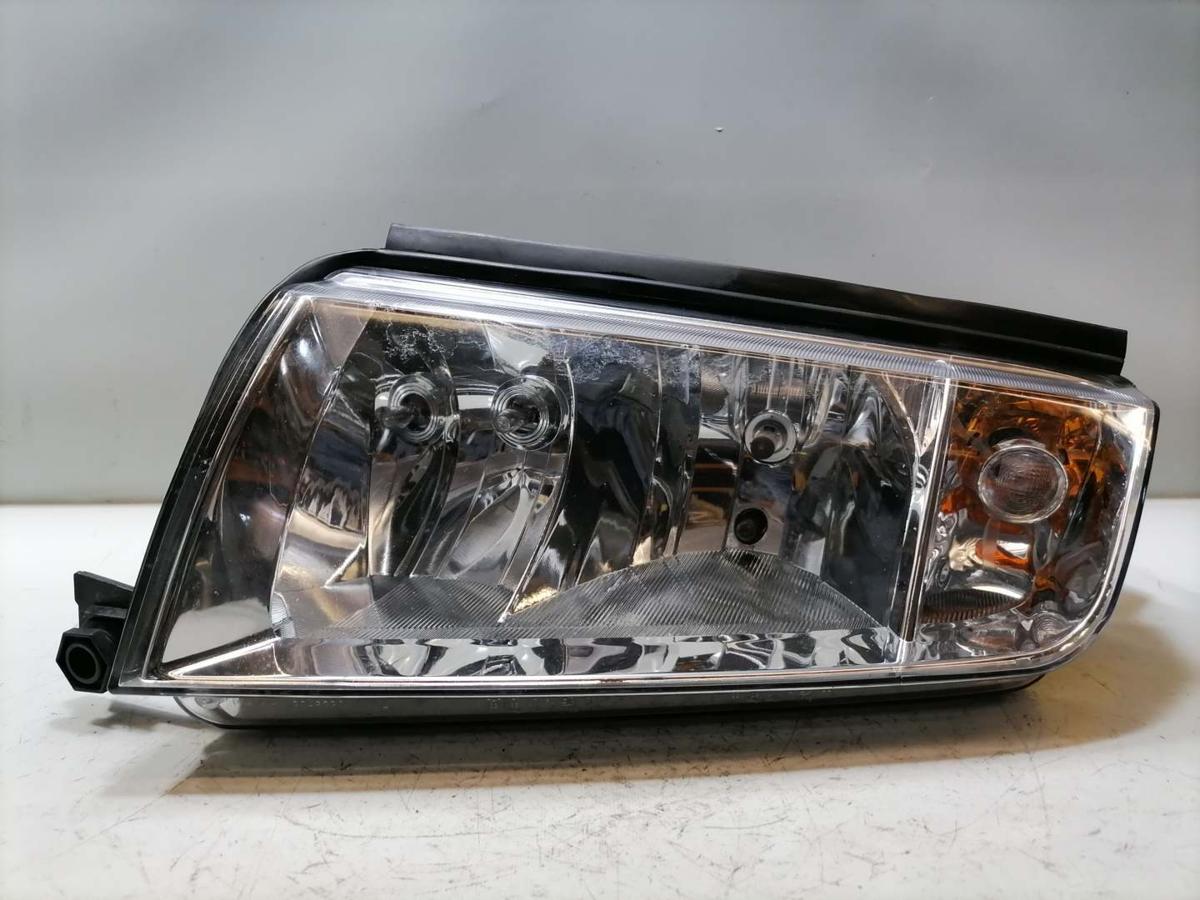 Skoda Fabia 6Y Scheinwerfer links Halogen Chrom Hintergrund Hersteller TYC Bj.2002